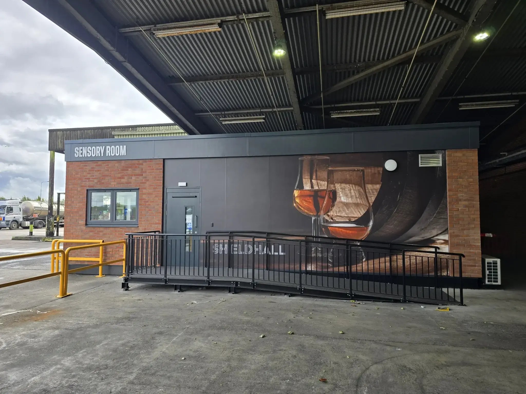 High-specification prefabricated commercial building delivered for Diageo’s Shieldhall site in Glasgow, featuring a modular sensory room designed for specialist operational and laboratory environments with minimal onsite disruption.