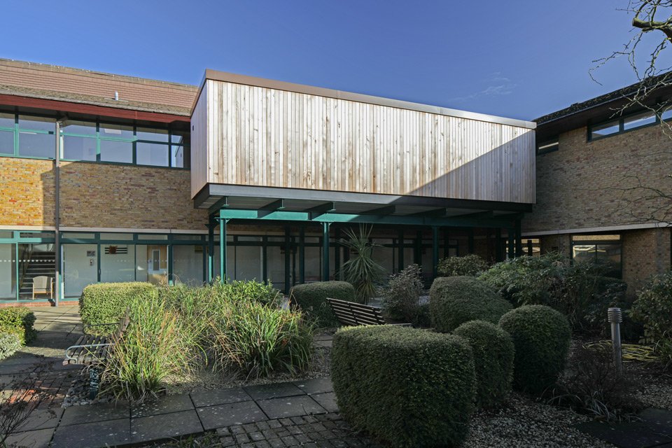 The outside garden surrounding a modular healthcare building installed on a hospital site.
