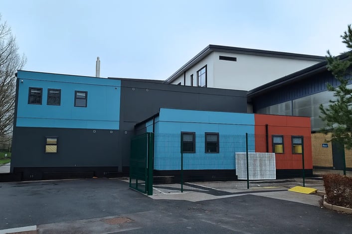 Permanent modular building successfully integrated within an existing operational site