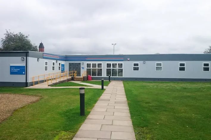 National Grids Modern modular building manufactured by Elite Systems GBwith accessible entrance, paved walkway, and landscaped lawn