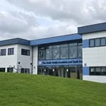 Permanent modular college and university campus building designed for teaching, research, student services and future expansion.