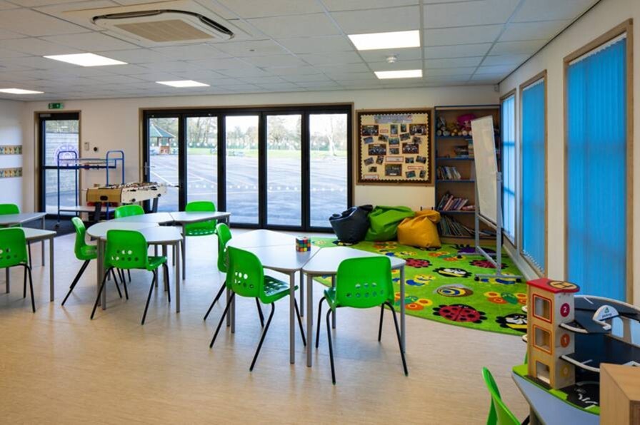 Colourful modular building nursery classroom with bright lighting, child-sized furniture and engaging learning materials for young learners