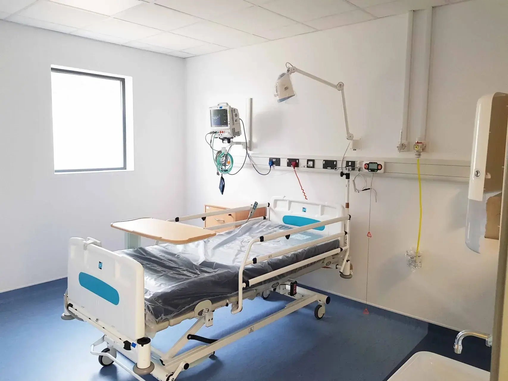 Modular healthcare building treatment room supporting dedicated clinical space within an NHS hospital