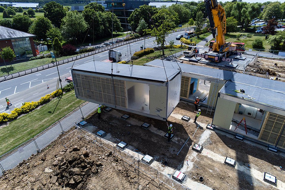 modular hospital ward being craned into place